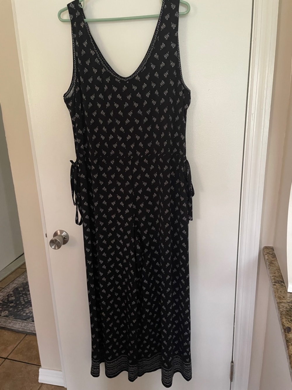 Black Sleeveless Printed Maxi Jumpsuit with Side Waist Ties
